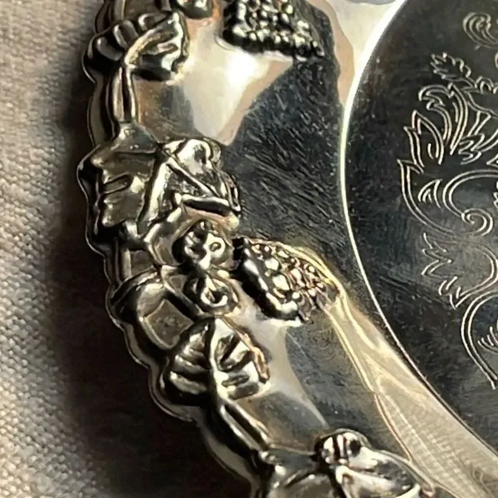 VTG Hong Kong etched grape leaves wine bottle coaster.
